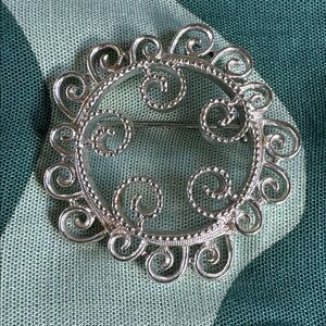 Elegant Silver Swirl Brooch